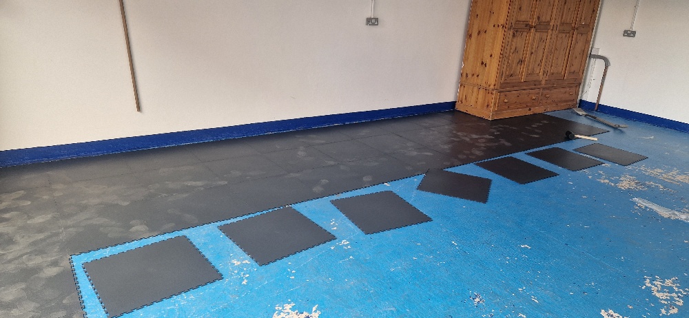 Flexi-Tile floor being installed in garage