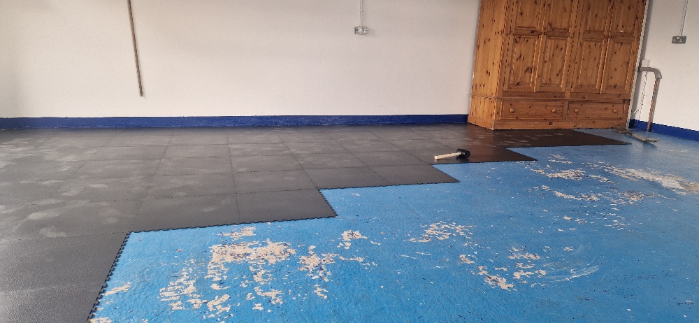Flexi-Tile floor being installed in garage